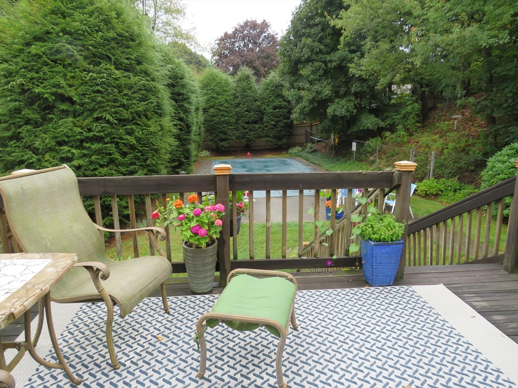 8 Talbot Road Canton, MA 02021 - Photo 31 of 41 a view of two chairs and table in the balcony