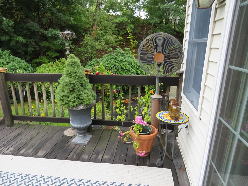 8 Talbot Road Canton, MA 02021 - Photo 32 of 41 a view of two chairs and table in the balcony