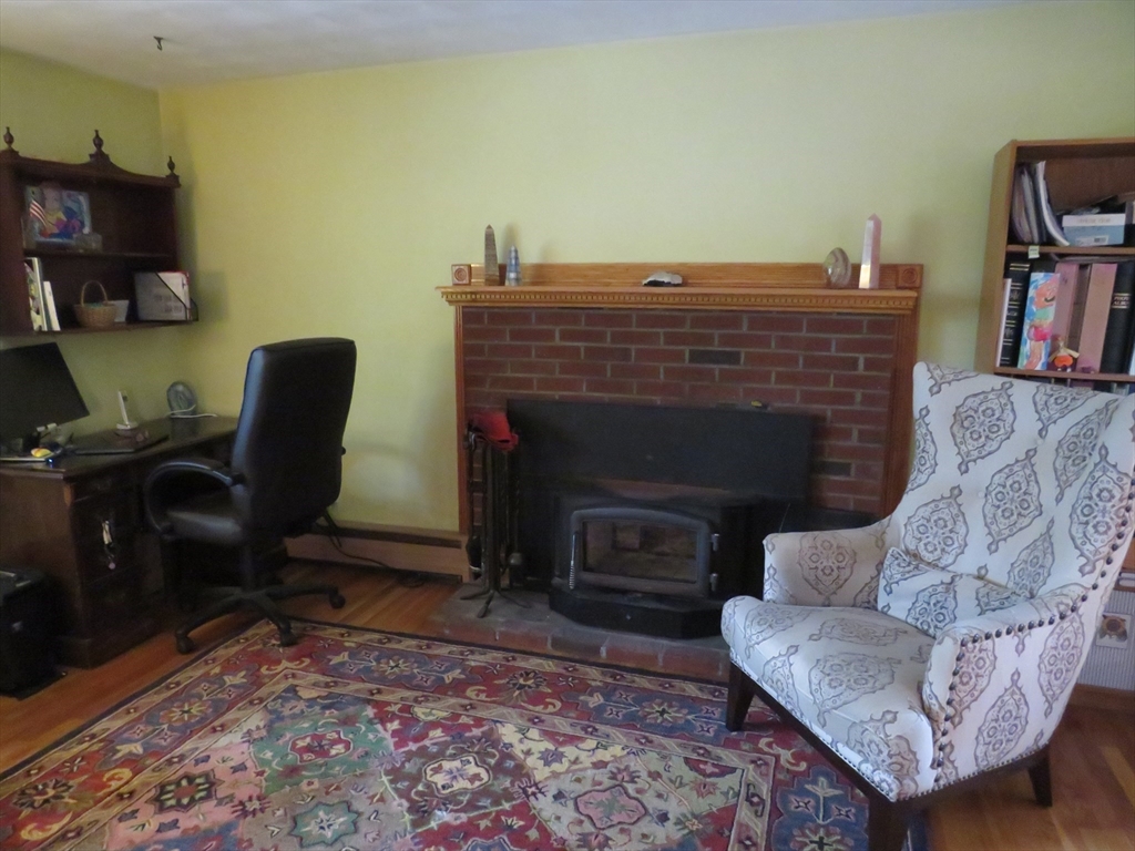 8 Talbot Road Canton, MA 02021 - Photo 6 of 41 a living room with furniture and a fireplace