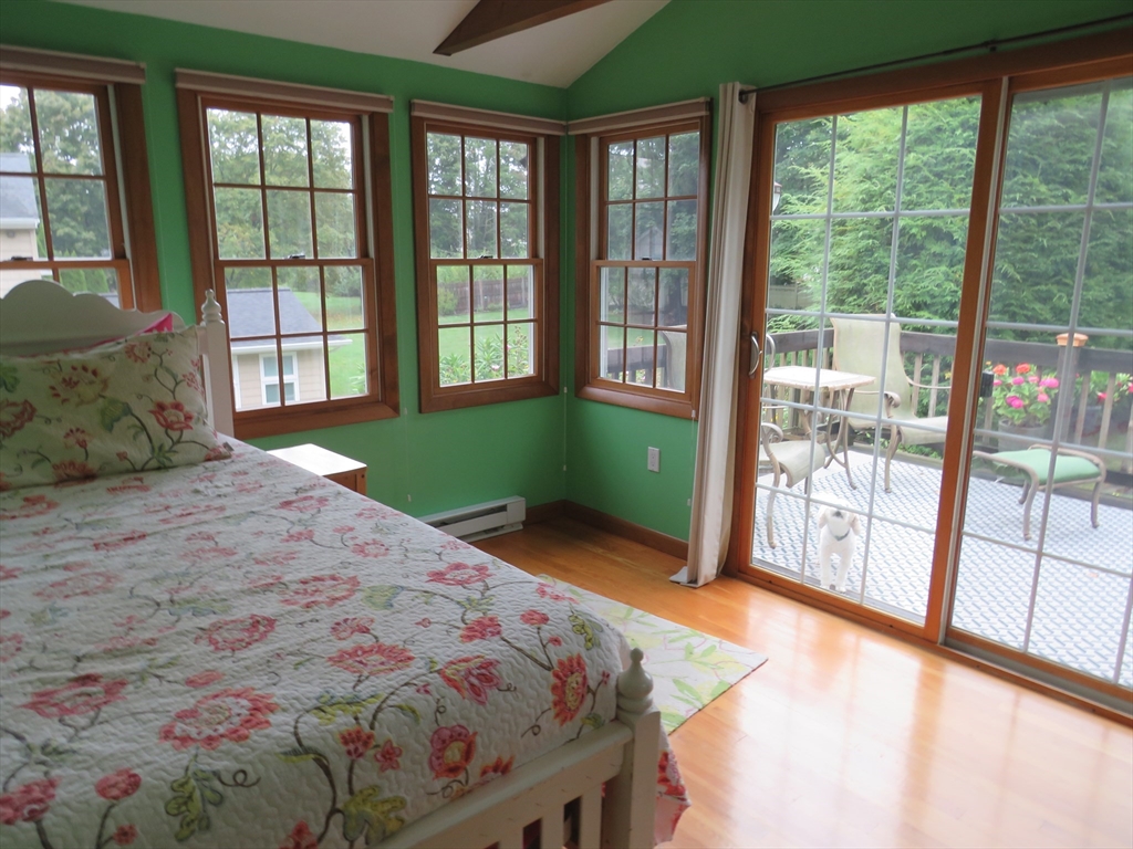 8 Talbot Road Canton, MA 02021 - Photo 7 of 41 a bedroom with a bed and a large window with outer view