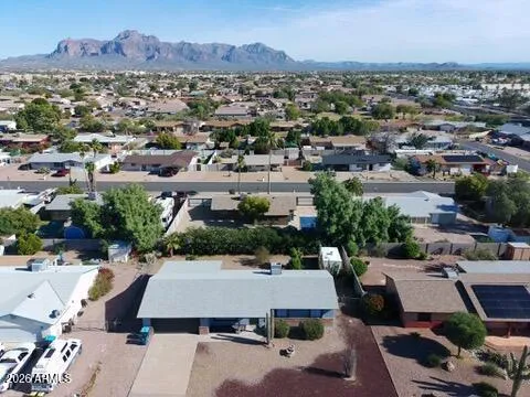 an aerial view of a residential houses and city street