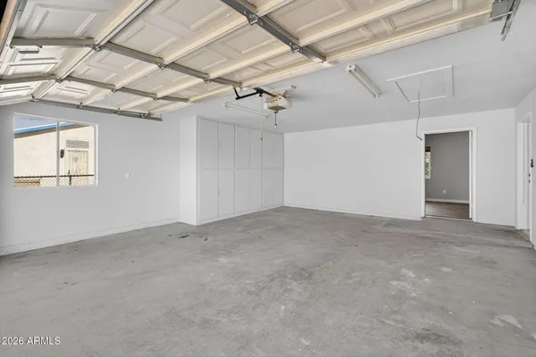 a view of a big room with carpet