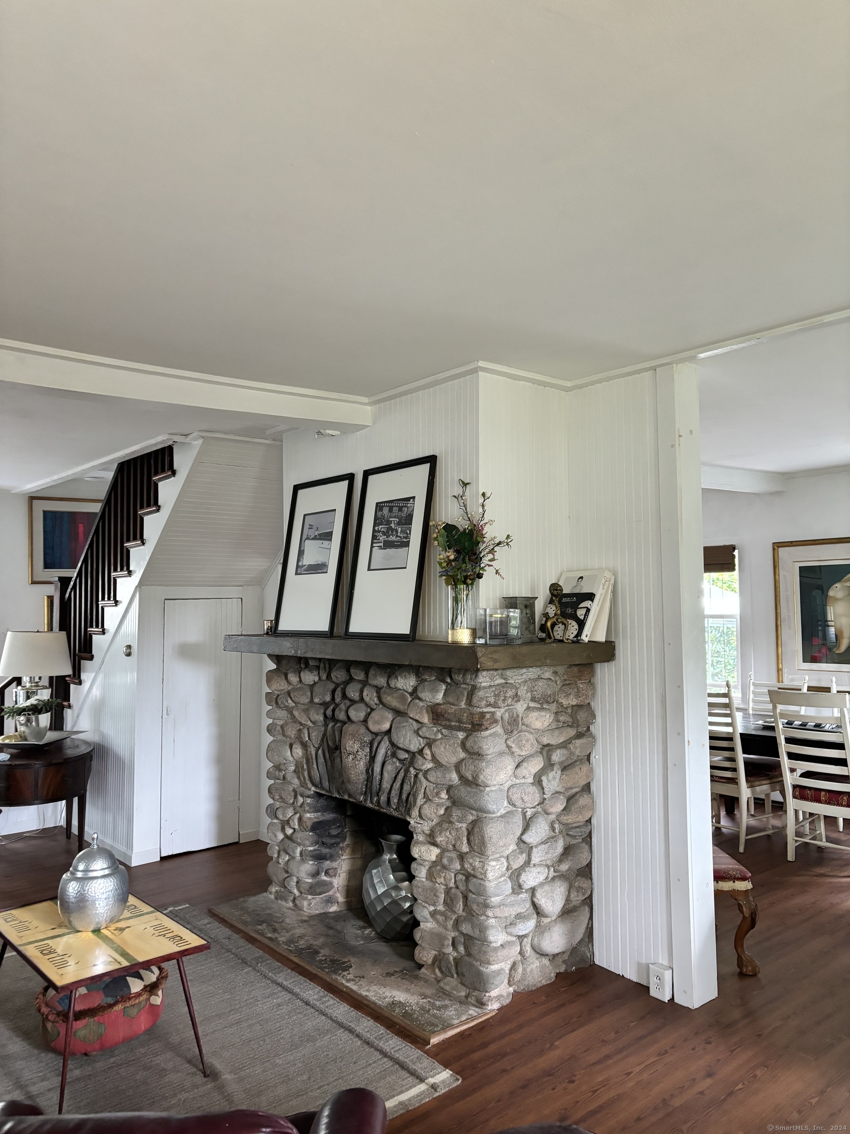 11 Uncas Road East Lyme, CT 06357 - Photo 13 of 28 a living room with furniture and a fireplace