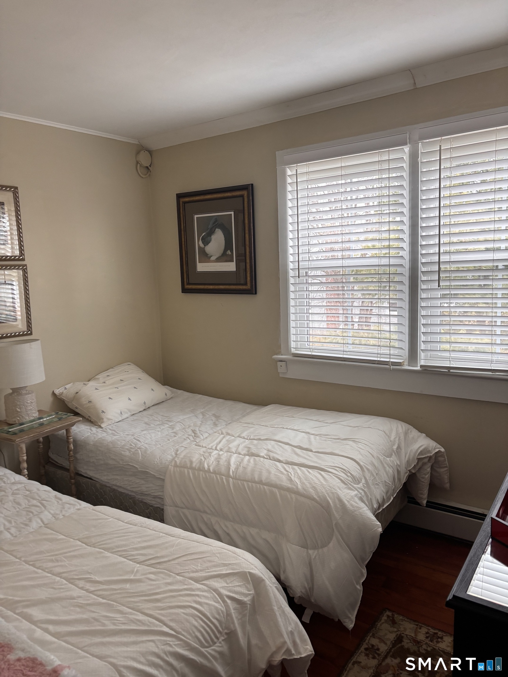 11 Uncas Road East Lyme, CT 06357 - Photo 20 of 28 a bedroom with a bed and a window