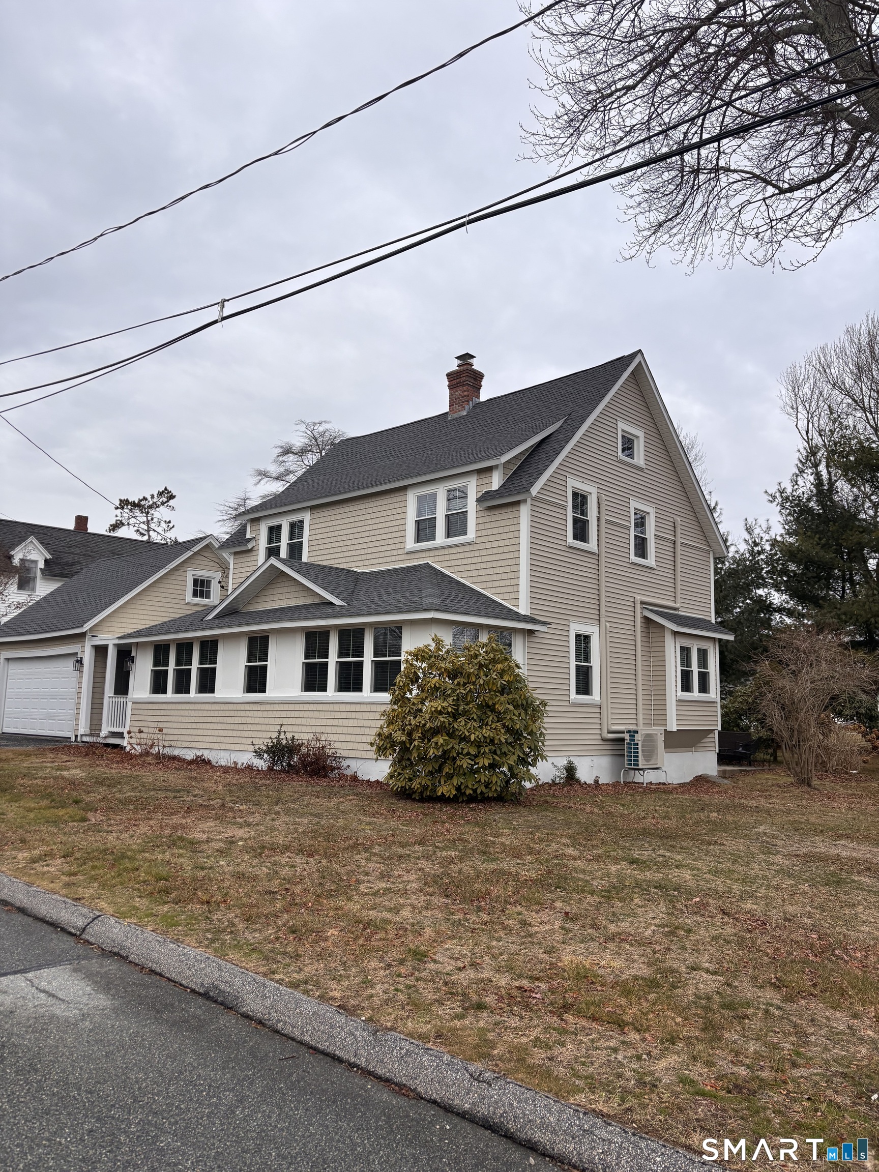 11 Uncas Road East Lyme, CT 06357 - Photo 2 of 28 a front view of a house with a garden