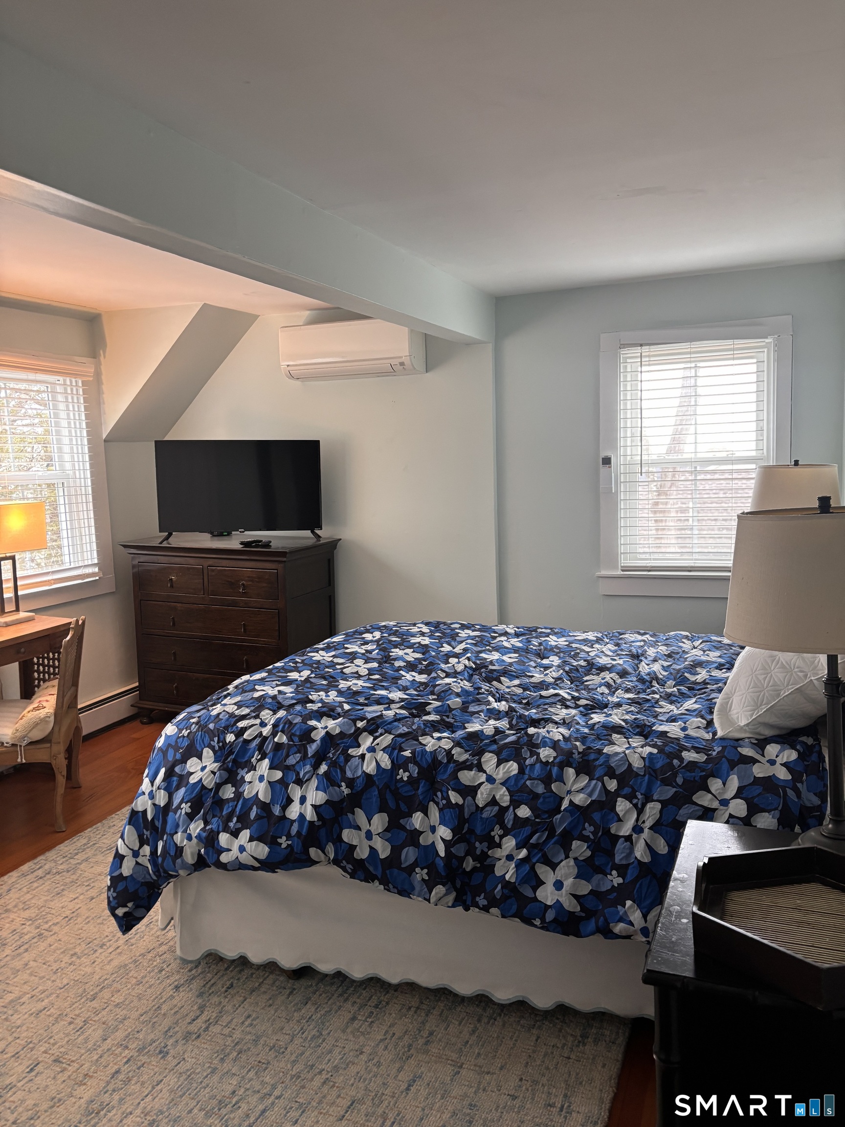 11 Uncas Road East Lyme, CT 06357 - Photo 23 of 28 a bedroom with a bed and a television