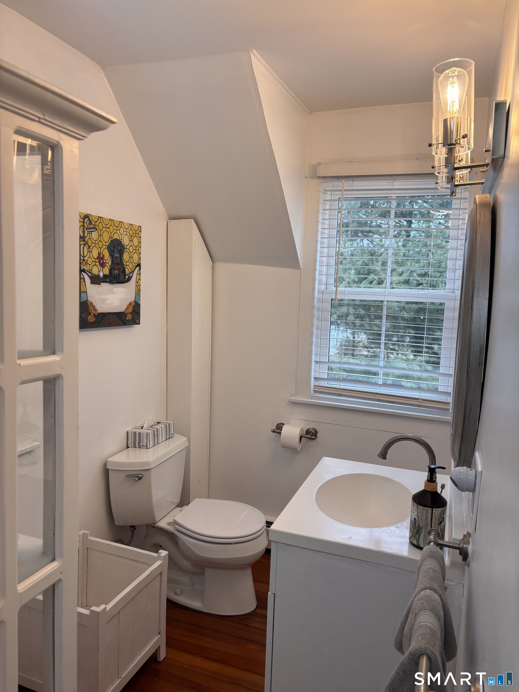 11 Uncas Road East Lyme, CT 06357 - Photo 25 of 28 a bathroom with a sink and mirror with toilet