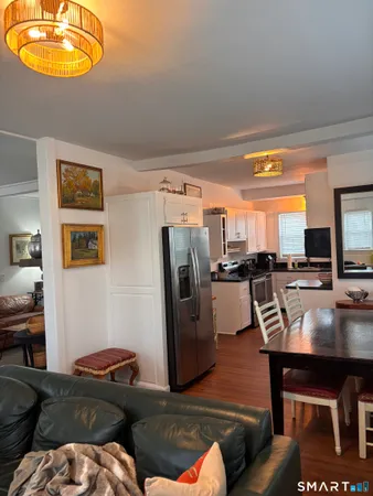 a living room with furniture and a table