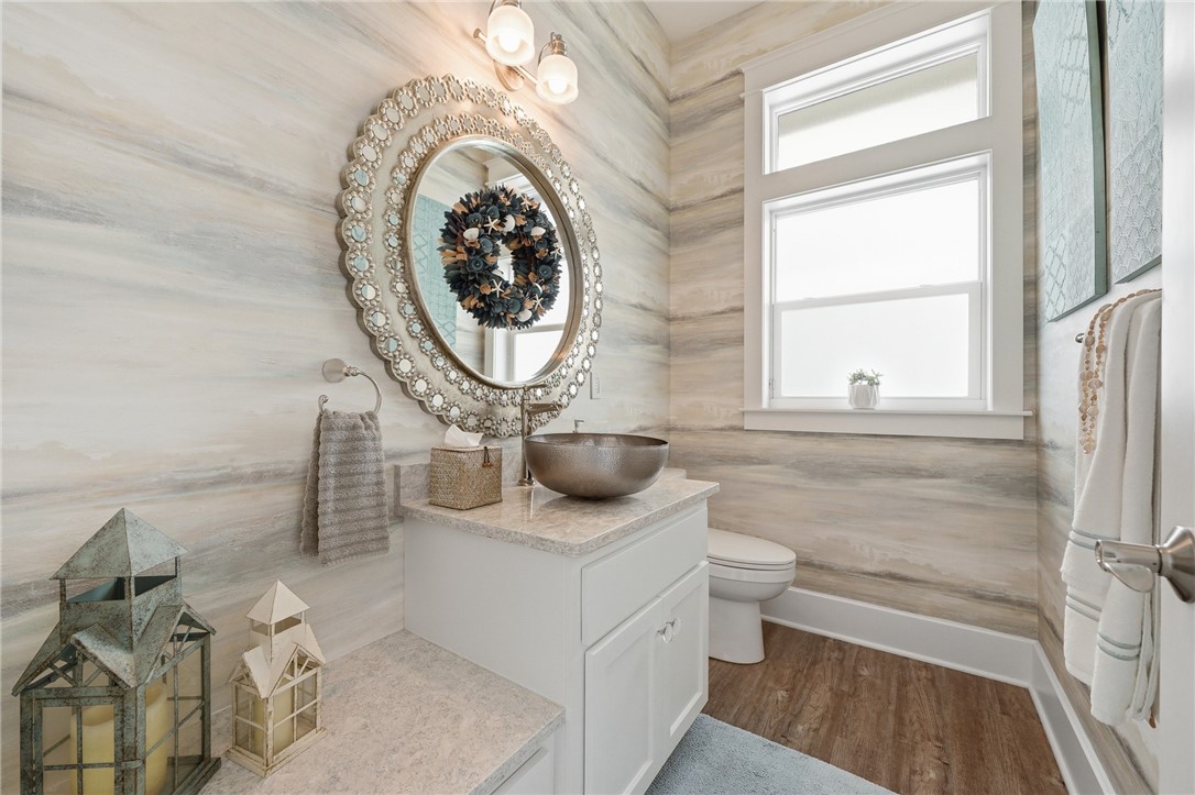 12 Sea Shell Shores Rockport, TX 78382 - Photo 13 of 40 a bathroom with a toilet and a sink