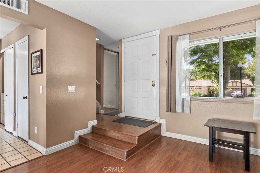 6668 Julliard Avenue, Unit D Moorpark, CA 93021 - Photo 4 of 31 a living room with furniture and a window