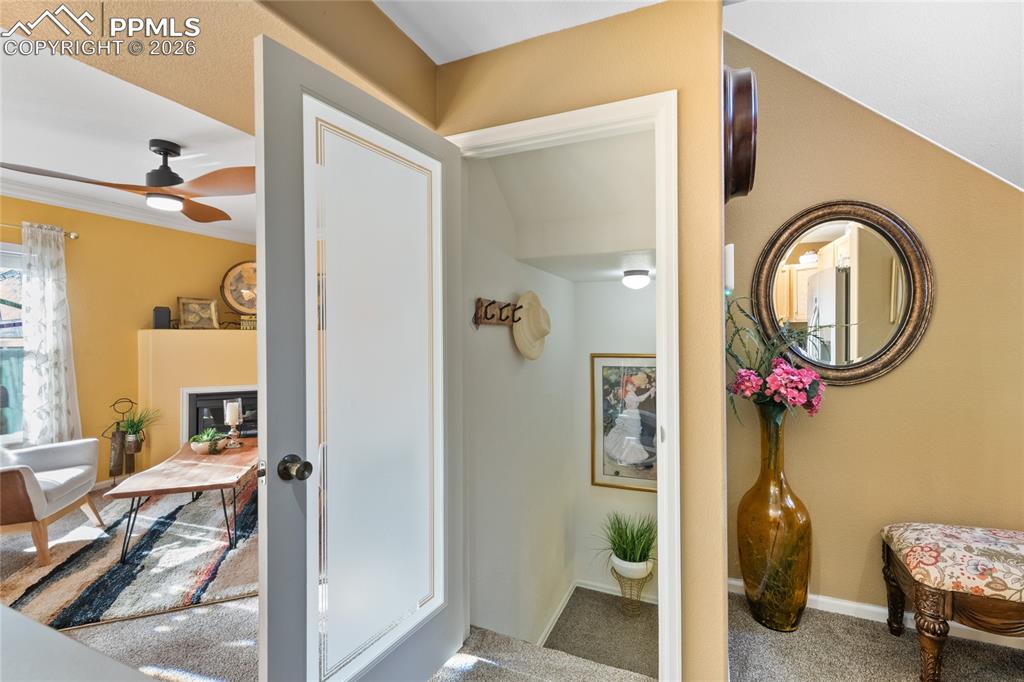 5639 Sunshade Point Colorado Springs, CO 80923 - Photo 28 of 36 a very nice looking room with a mirror