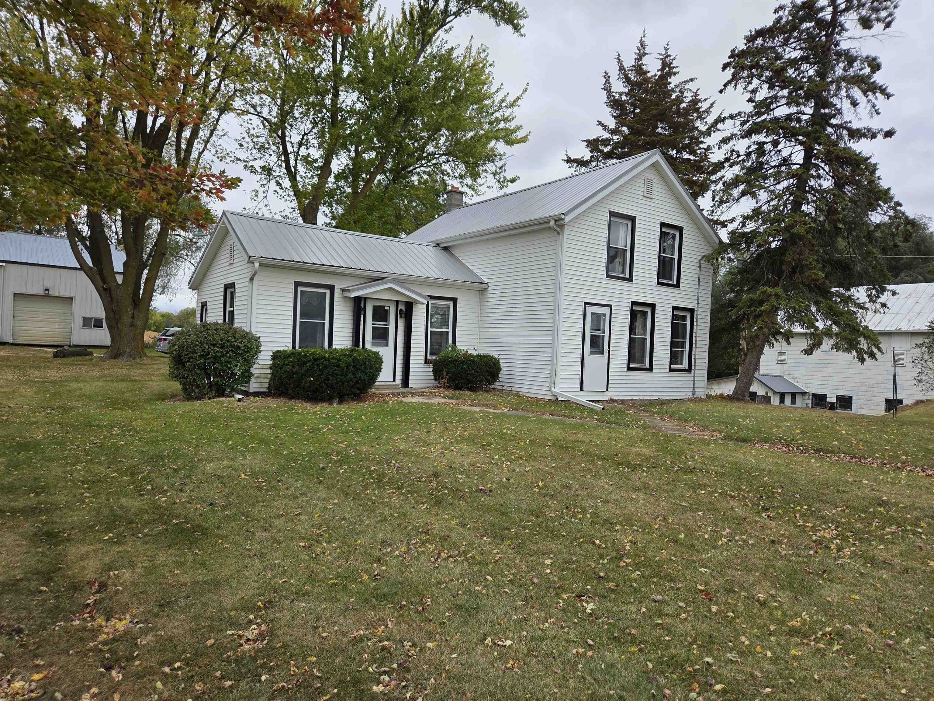 5910 North Unity Road Lena, IL 61048 - Photo 1 of 34 a front view of house with yard and trees