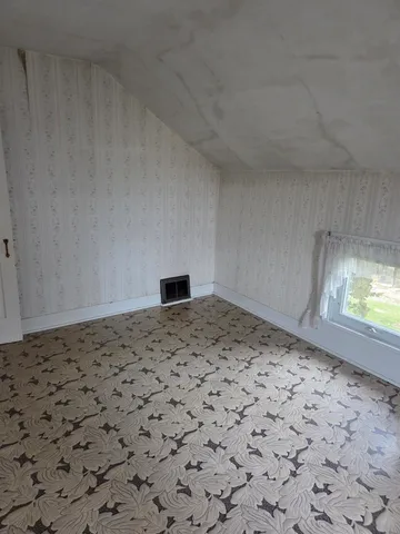 a view of a room with a window