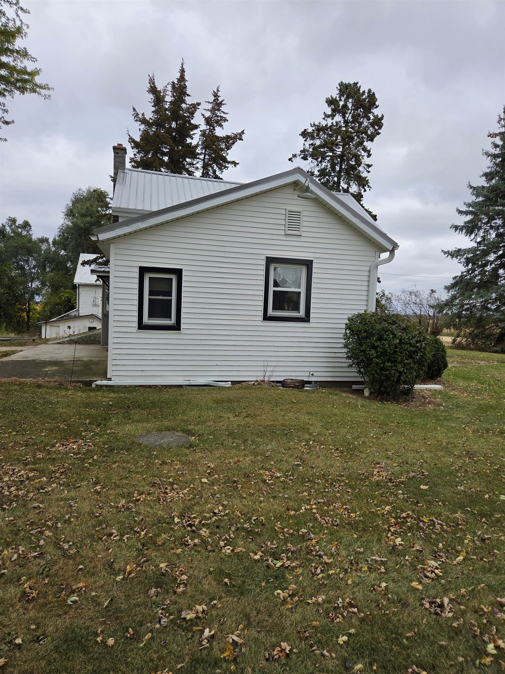5910 North Unity Road Lena, IL 61048 - Photo 22 of 34 a house that has a tree in front of it