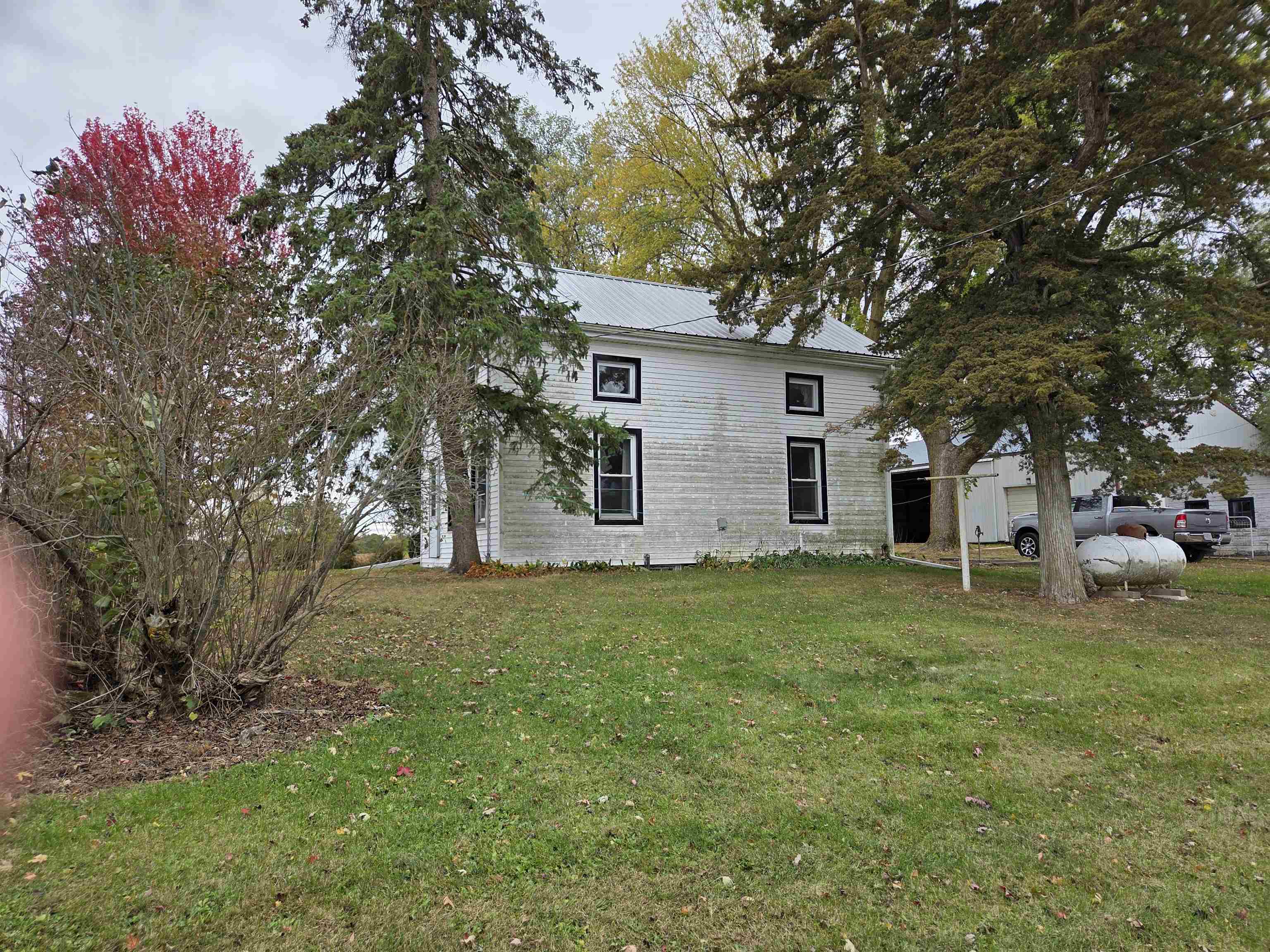 5910 North Unity Road Lena, IL 61048 - Photo 23 of 34 a backyard of a house with lots of green space
