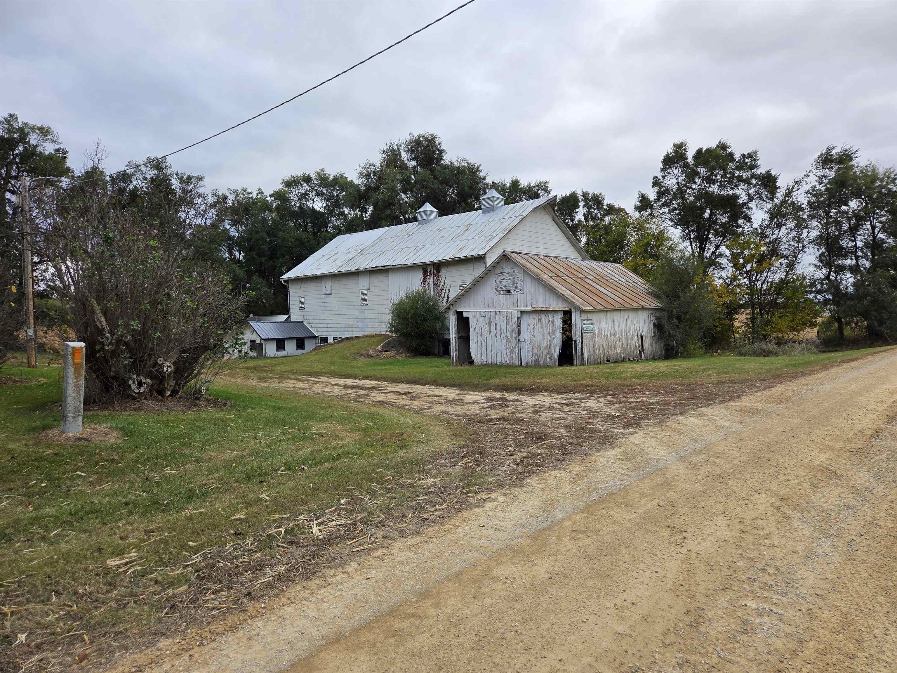 5910 North Unity Road Lena, IL 61048 - Photo 31 of 34 a house with green field in front of it