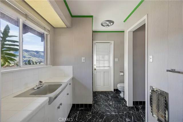 a bathroom with a sink and a bathtub