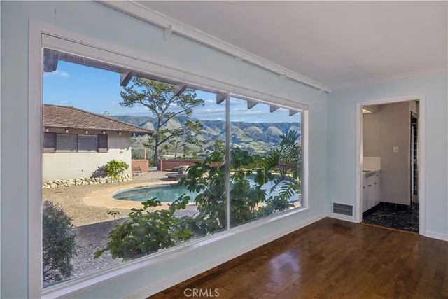 a view of a porch and a yard
