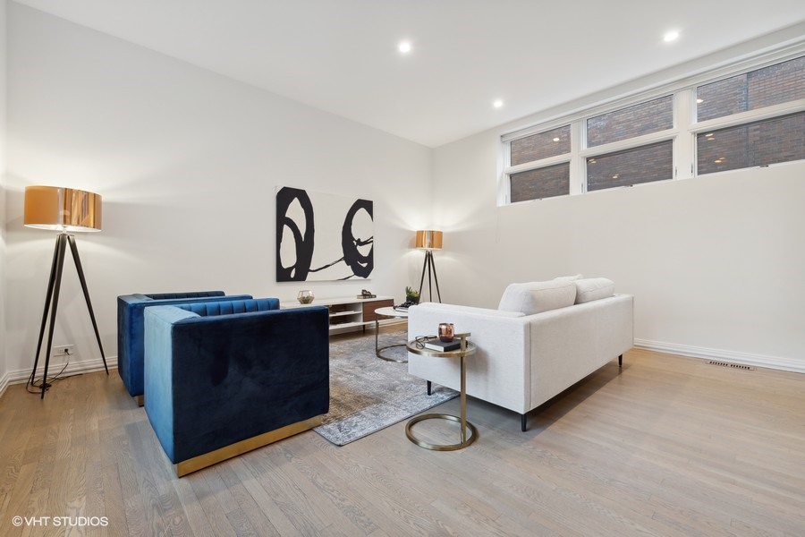 1011 North Dearborn Street Chicago, IL 60610 - Photo 14 of 33 a living room with furniture and wooden floor