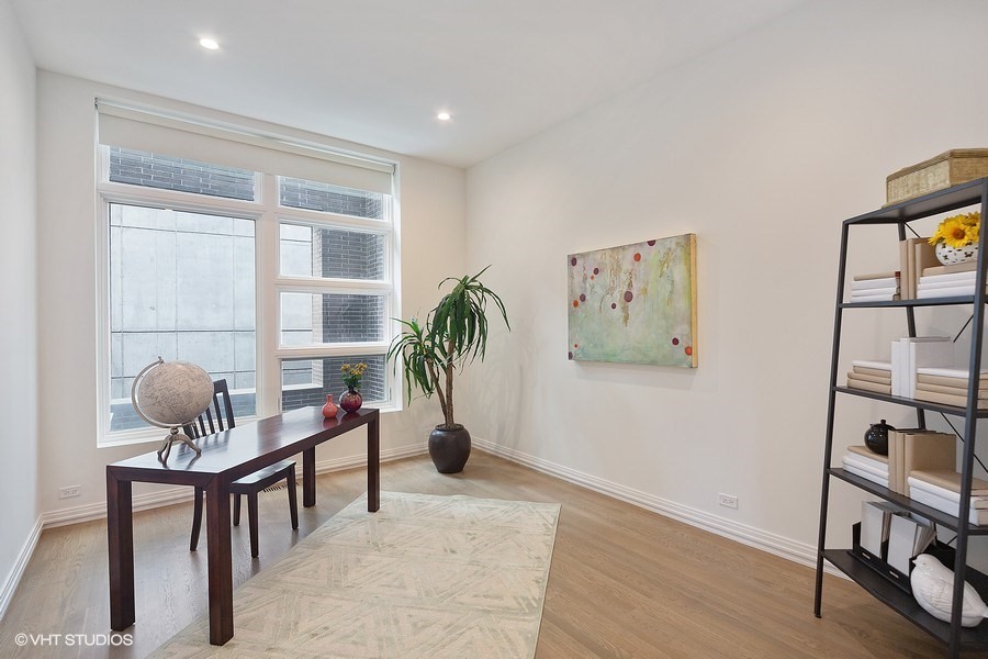 1011 North Dearborn Street Chicago, IL 60610 - Photo 17 of 33 a living room with furniture and wooden floor