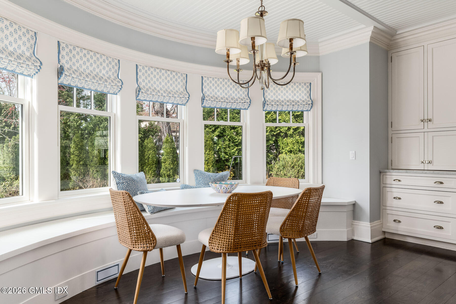 45 Willow Road Riverside, CT 06878 - Photo 11 of 35 a view of a dining room with furniture wooden floor and chandelier