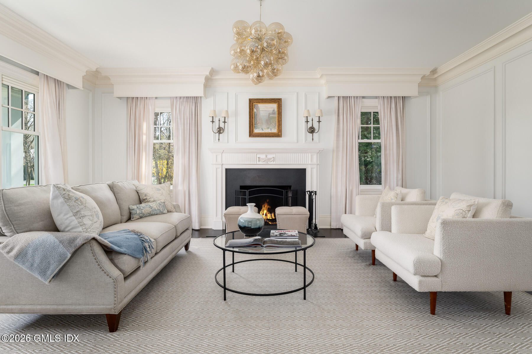 45 Willow Road Riverside, CT 06878 - Photo 5 of 35 a living room with furniture a fireplace and a window