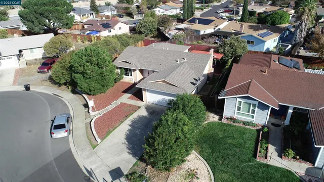 an aerial view of house with yard
