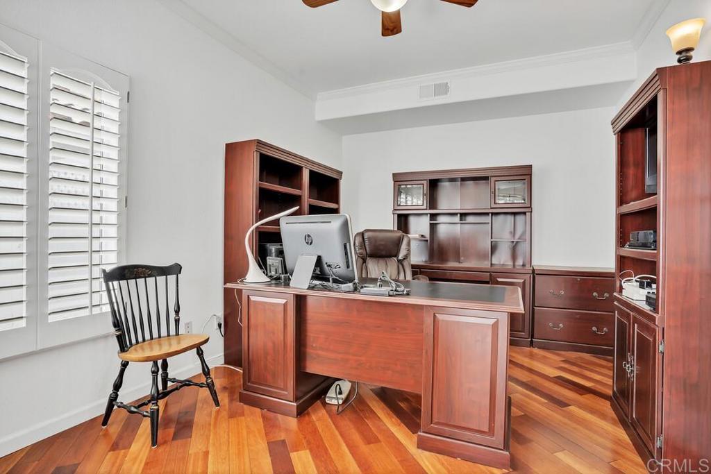 4617 Cyrus Way Oceanside, CA 92056 - Photo 11 of 63 a room with furniture a flat screen tv and a window