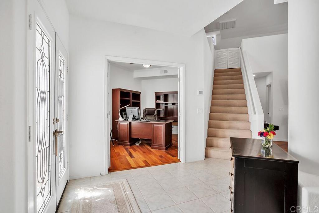 4617 Cyrus Way Oceanside, CA 92056 - Photo 12 of 63 a view of living room kitchen and entryway