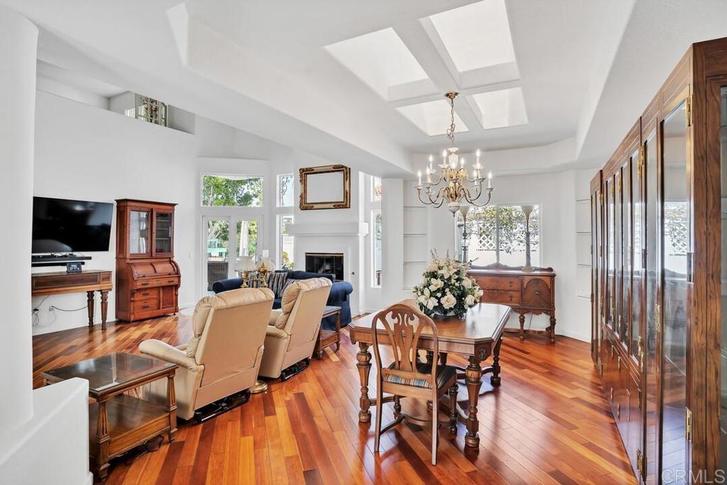 4617 Cyrus Way Oceanside, CA 92056 - Photo 16 of 63 a view of a dining room with furniture window and wooden floor