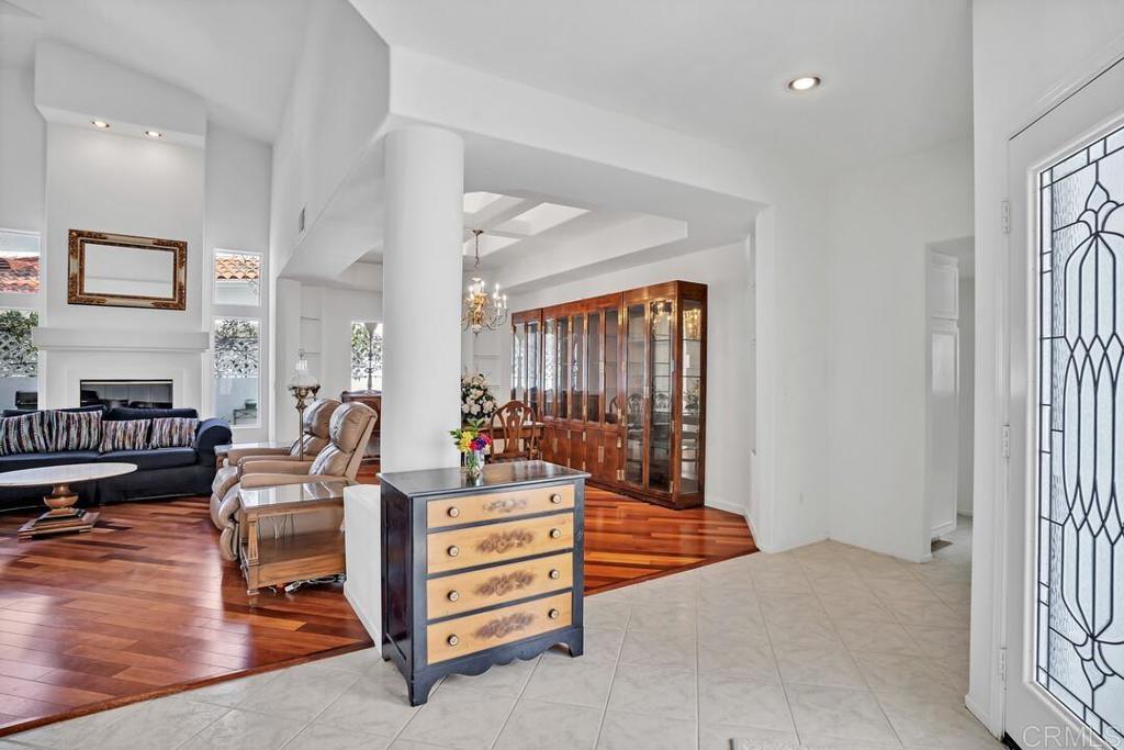 4617 Cyrus Way Oceanside, CA 92056 - Photo 17 of 63 a living room with furniture and wooden floor
