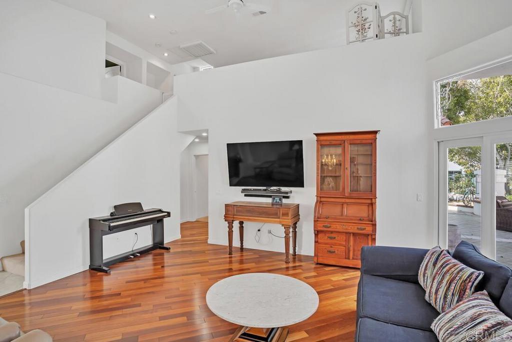 4617 Cyrus Way Oceanside, CA 92056 - Photo 21 of 63 a living room with furniture and a flat screen tv