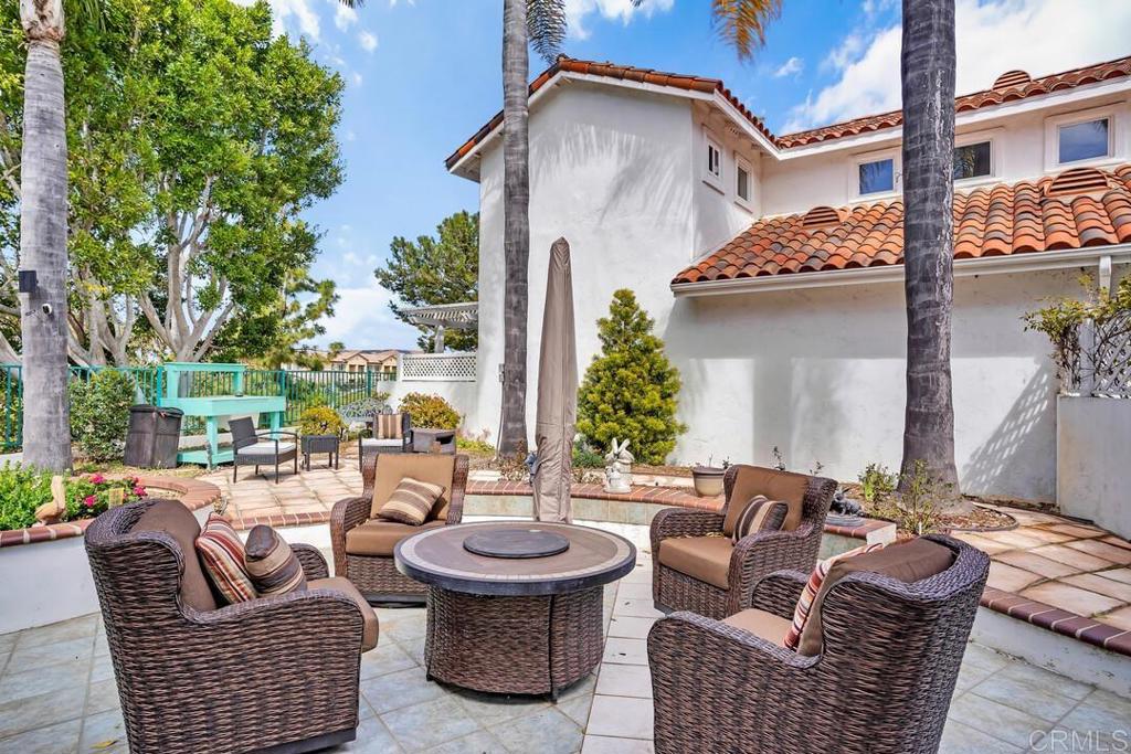 4617 Cyrus Way Oceanside, CA 92056 - Photo 38 of 63 a patio with patio a couch and chairs