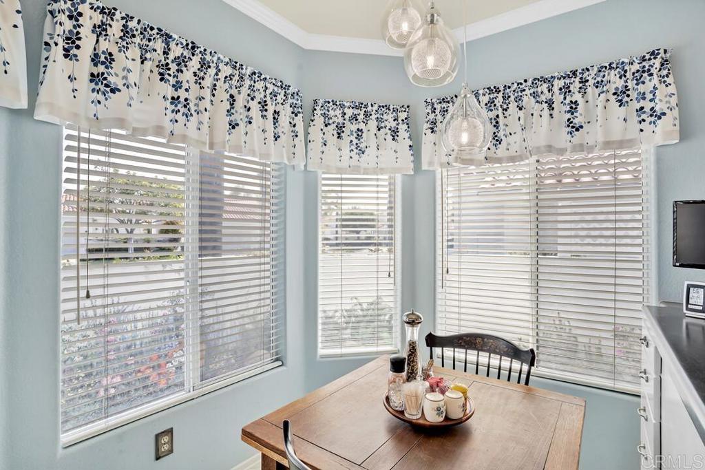 4617 Cyrus Way Oceanside, CA 92056 - Photo 8 of 63 a room with furniture and a large window