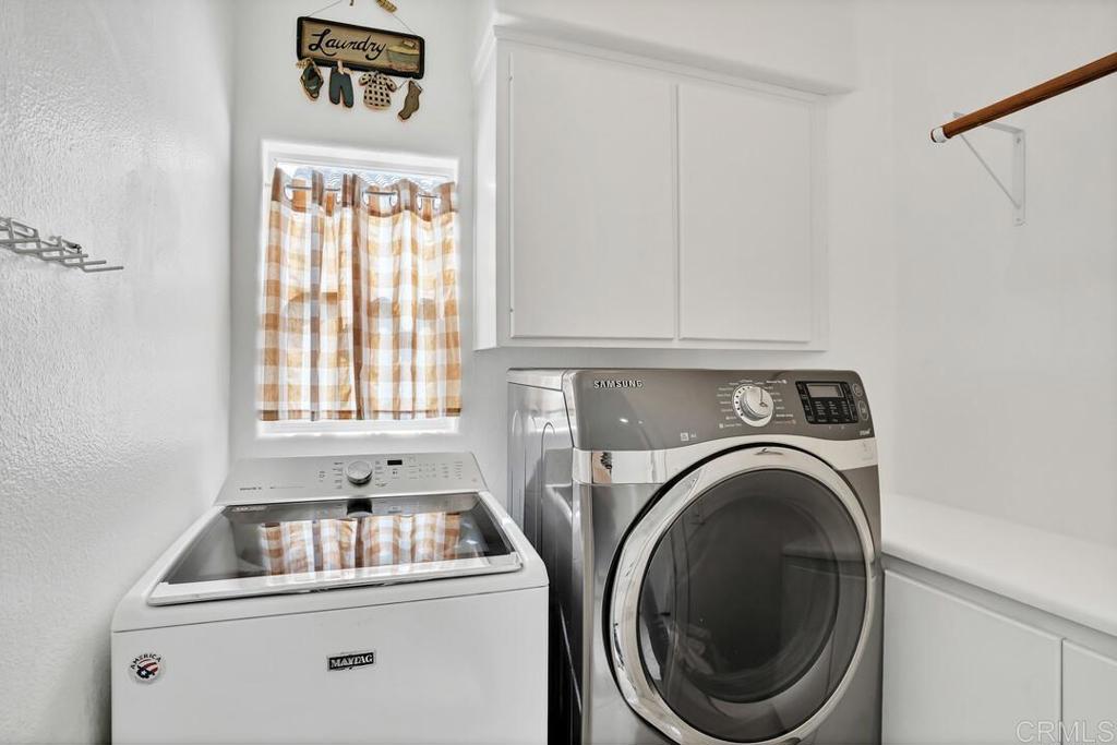 4617 Cyrus Way Oceanside, CA 92056 - Photo 10 of 63 a utility room with dryer and washer