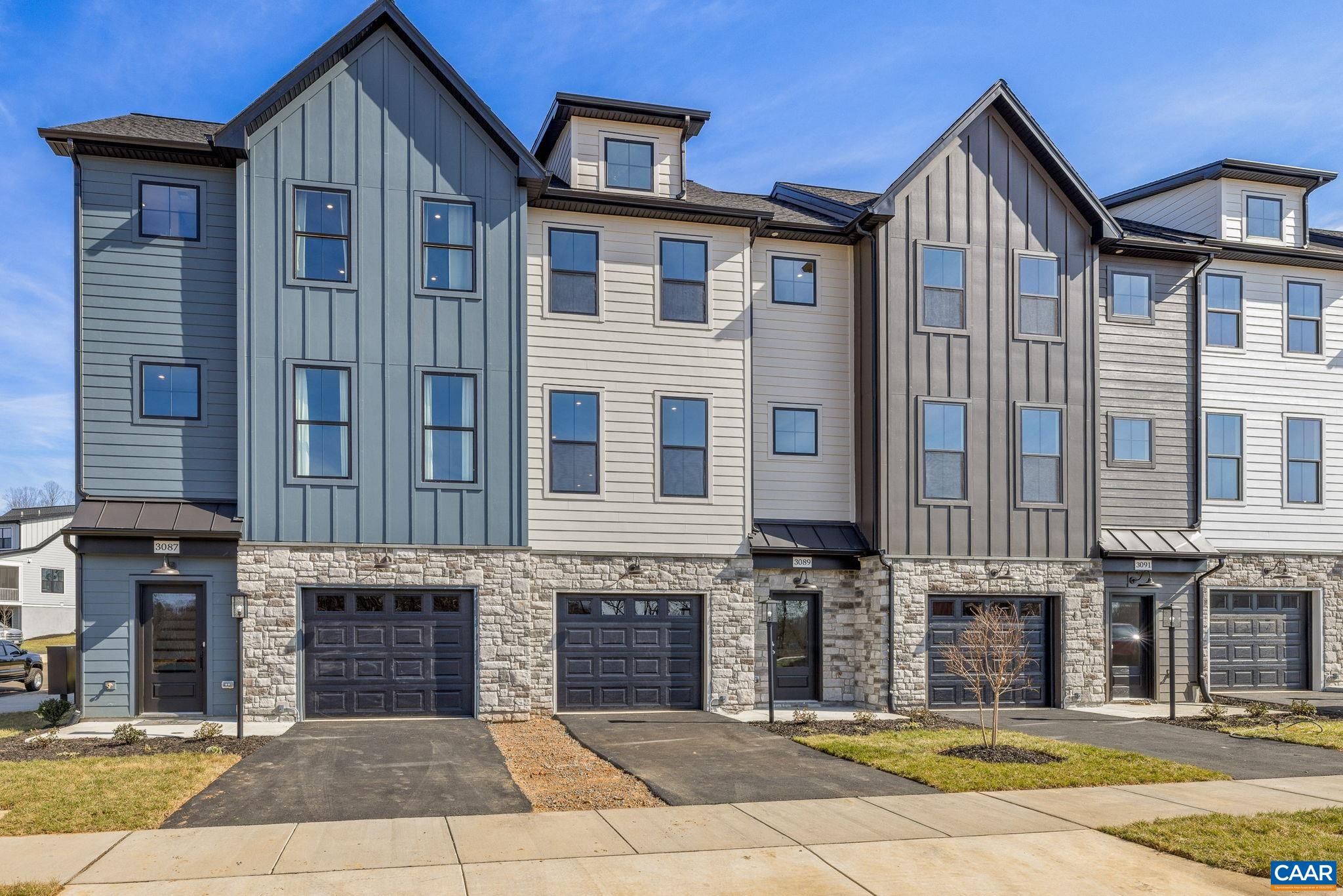 3089 Miranda Crossing Charlottesville, VA 22901 - Photo 1 of 47 a view of a building with many windows
