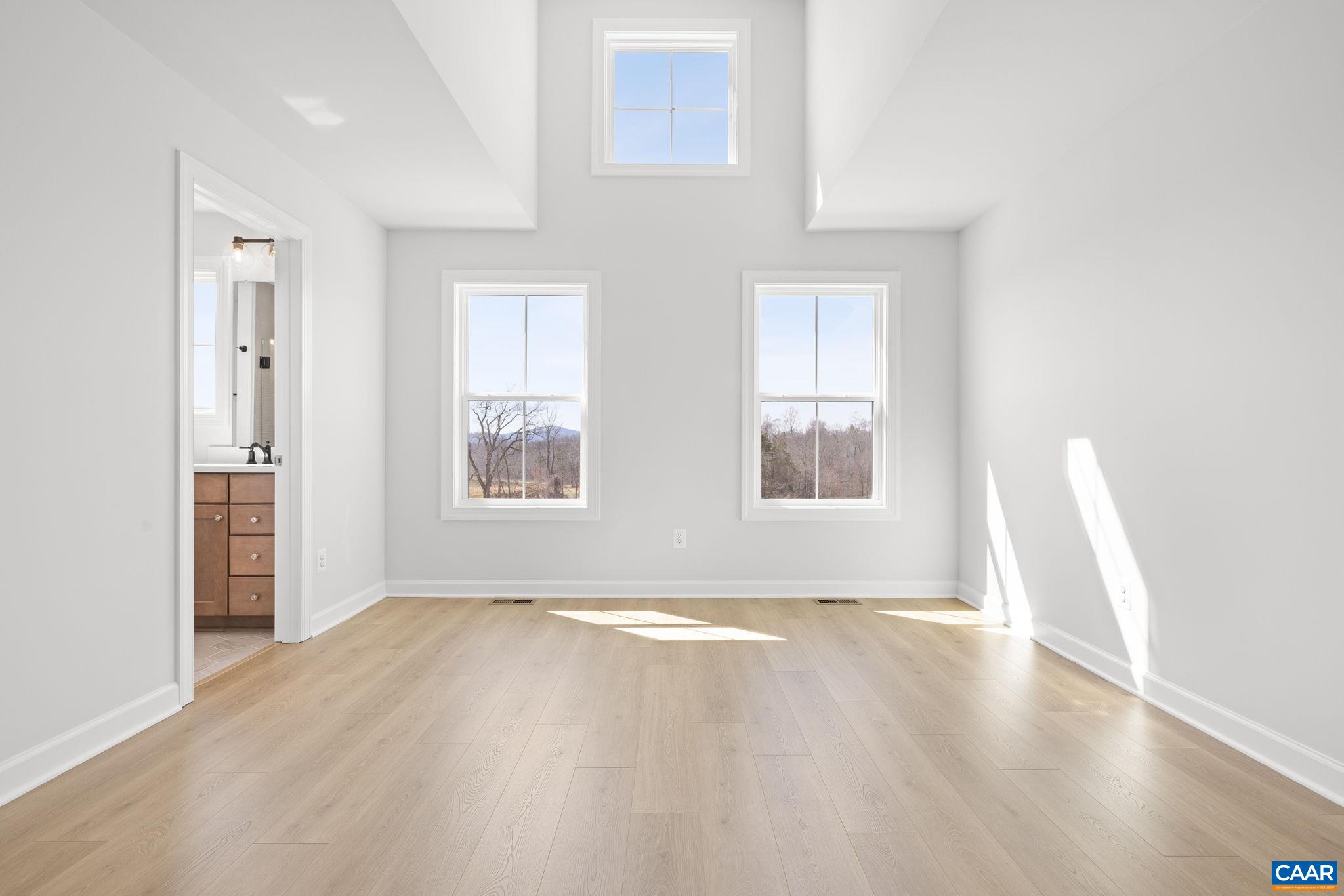 3089 Miranda Crossing Charlottesville, VA 22901 - Photo 16 of 47 a view of livingroom with hardwood floor and window