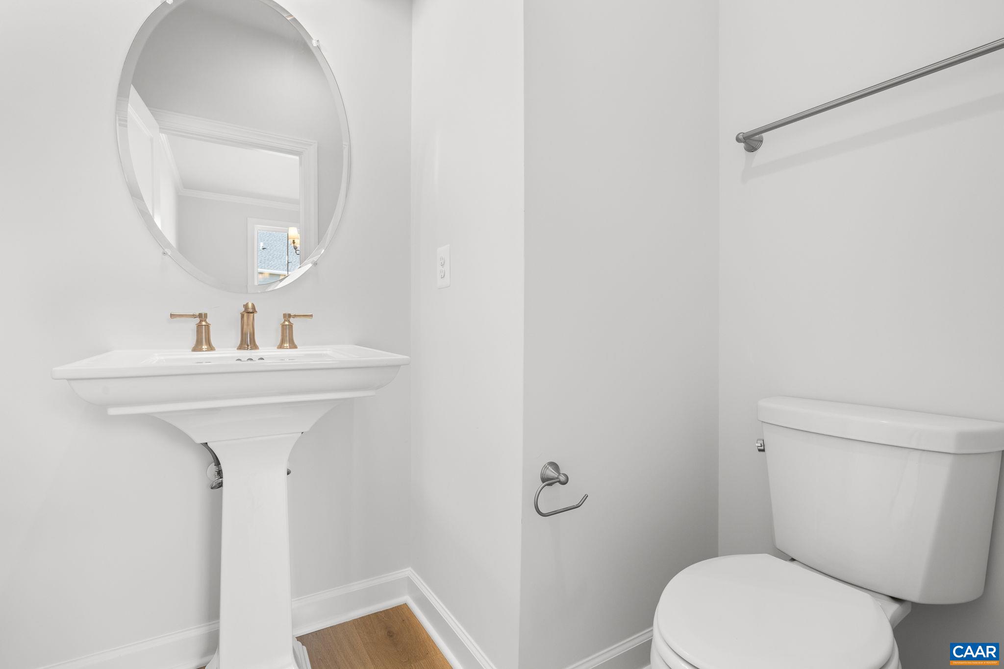3089 Miranda Crossing Charlottesville, VA 22901 - Photo 31 of 47 a bathroom with a sink toilet and a mirror