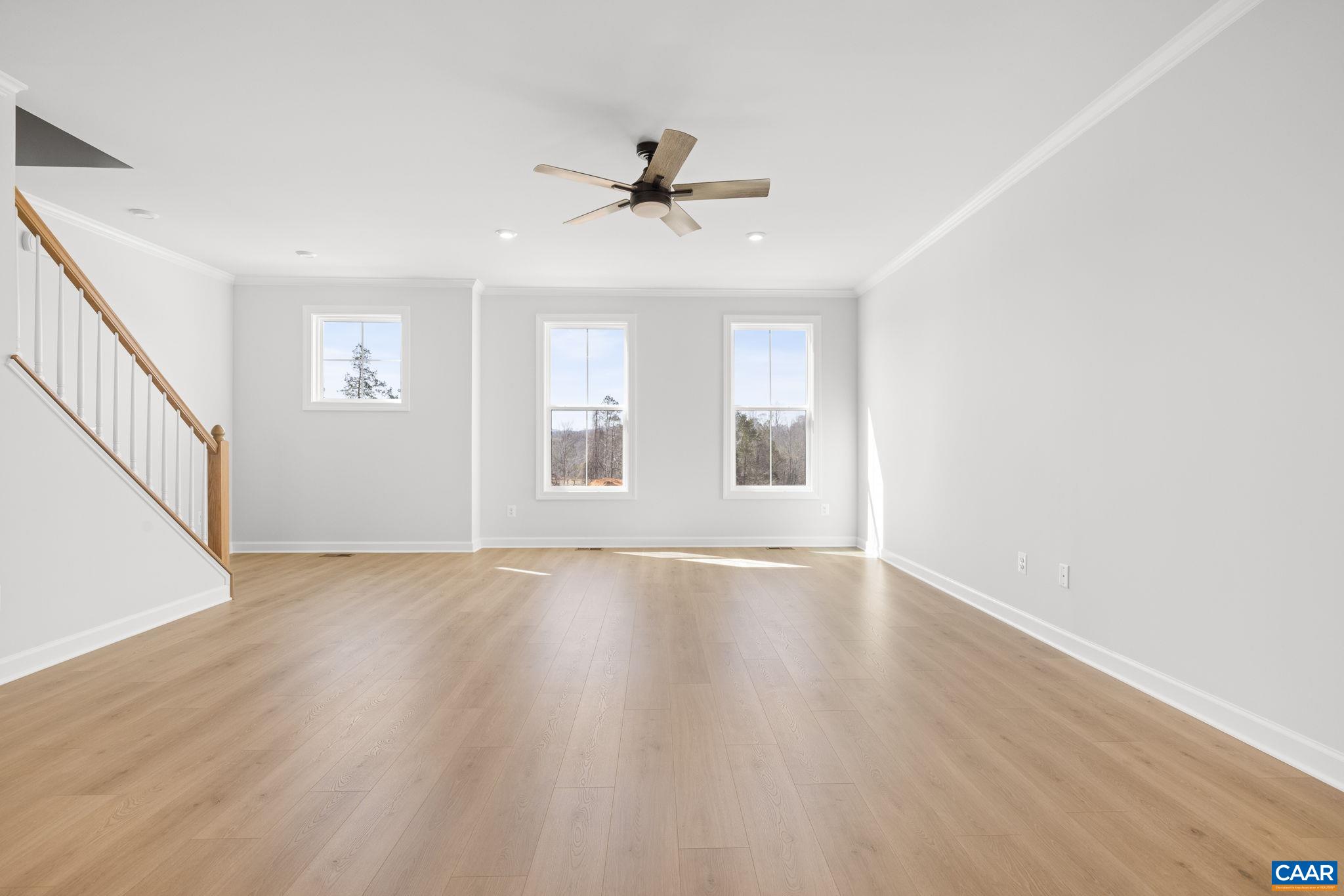 3089 Miranda Crossing Charlottesville, VA 22901 - Photo 37 of 47 wooden floor in an empty room with a window