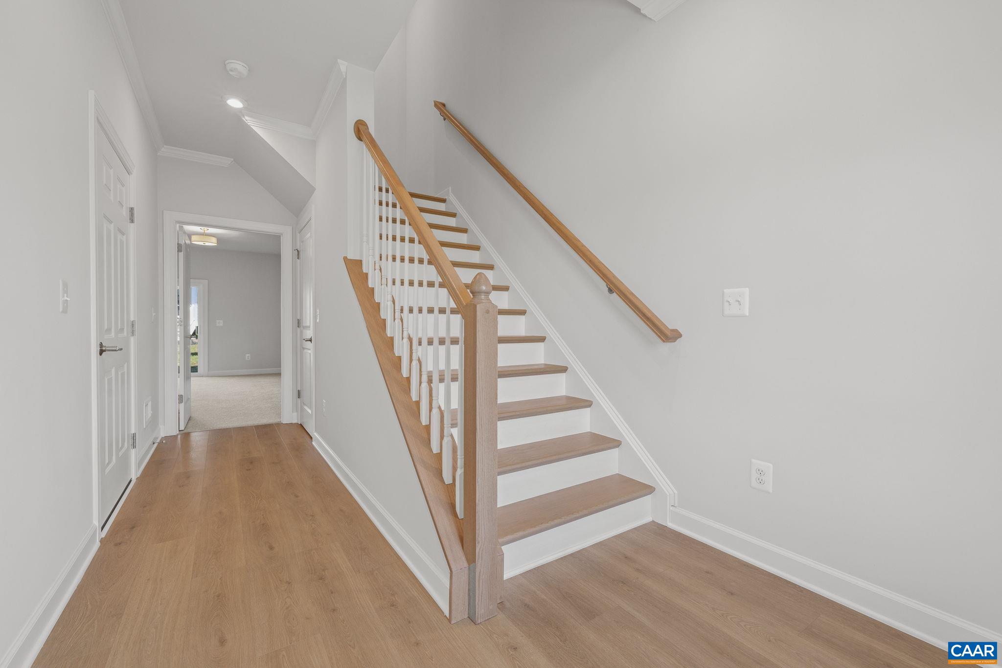 3089 Miranda Crossing Charlottesville, VA 22901 - Photo 5 of 47 a view of a hallway with wooden floor and entryway