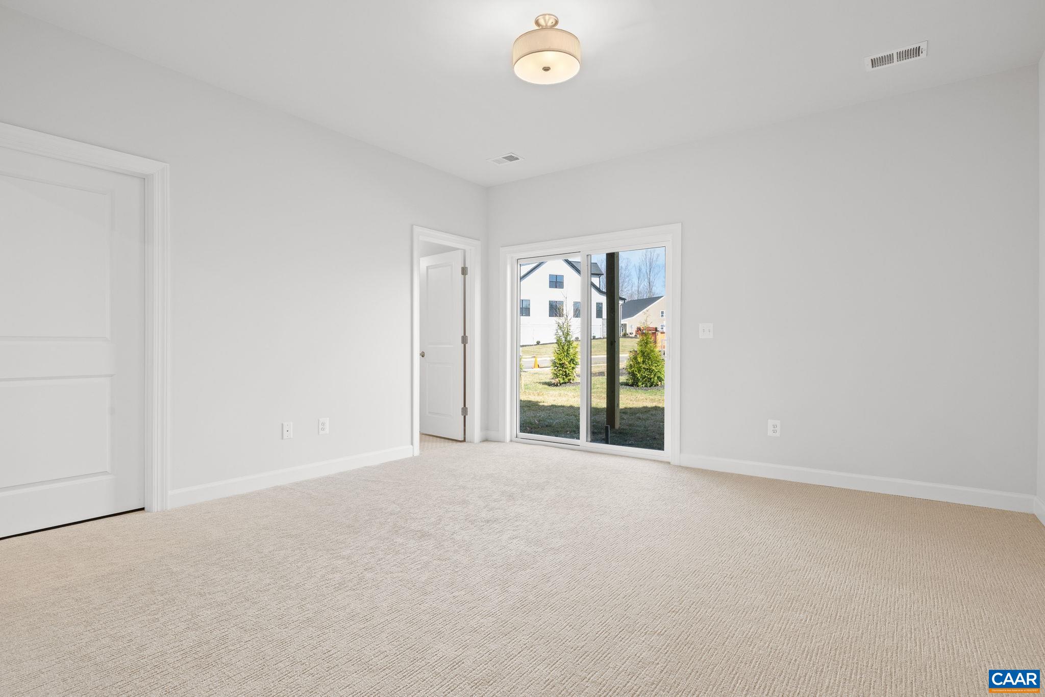 3089 Miranda Crossing Charlottesville, VA 22901 - Photo 7 of 47 a view of an empty room with a window