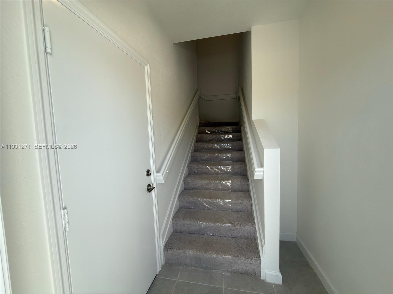 12426 Southwest 248th Street, Unit 1 Homestead, FL 33032 - Photo 5 of 13 a view of entryway