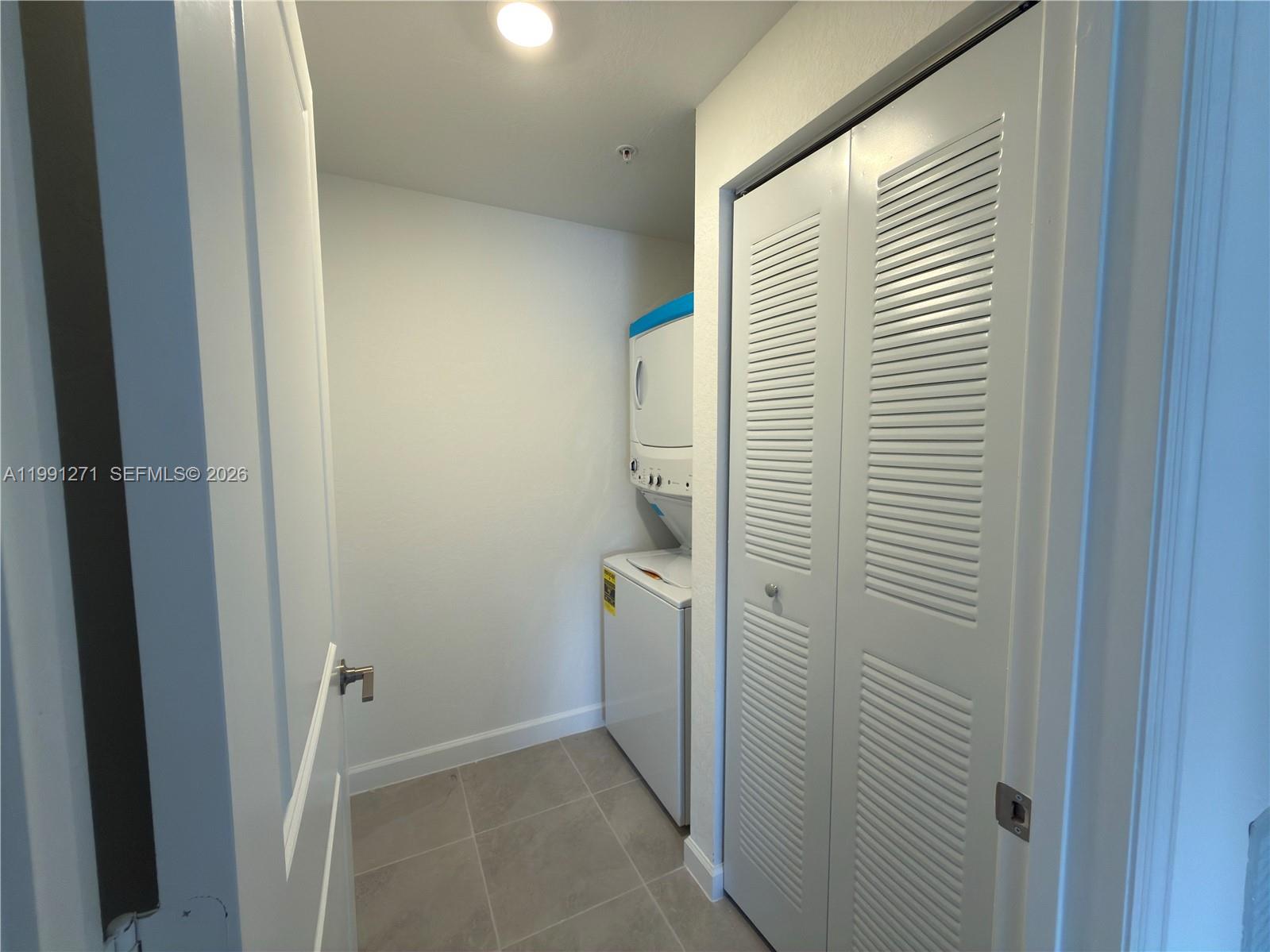 12426 Southwest 248th Street, Unit 1 Homestead, FL 33032 - Photo 8 of 13 a view of bathroom