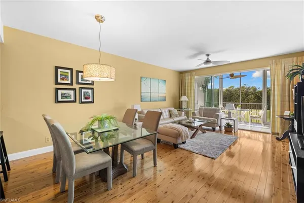 a view of a livingroom with furniture and window