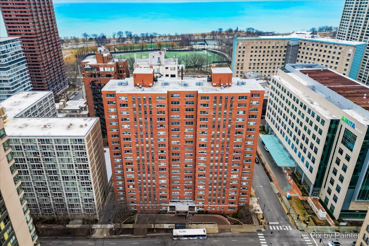 2909 North Sheridan Road, Unit 1507 Chicago, IL 60657 - Photo 19 of 27 a view of a city with tall buildings