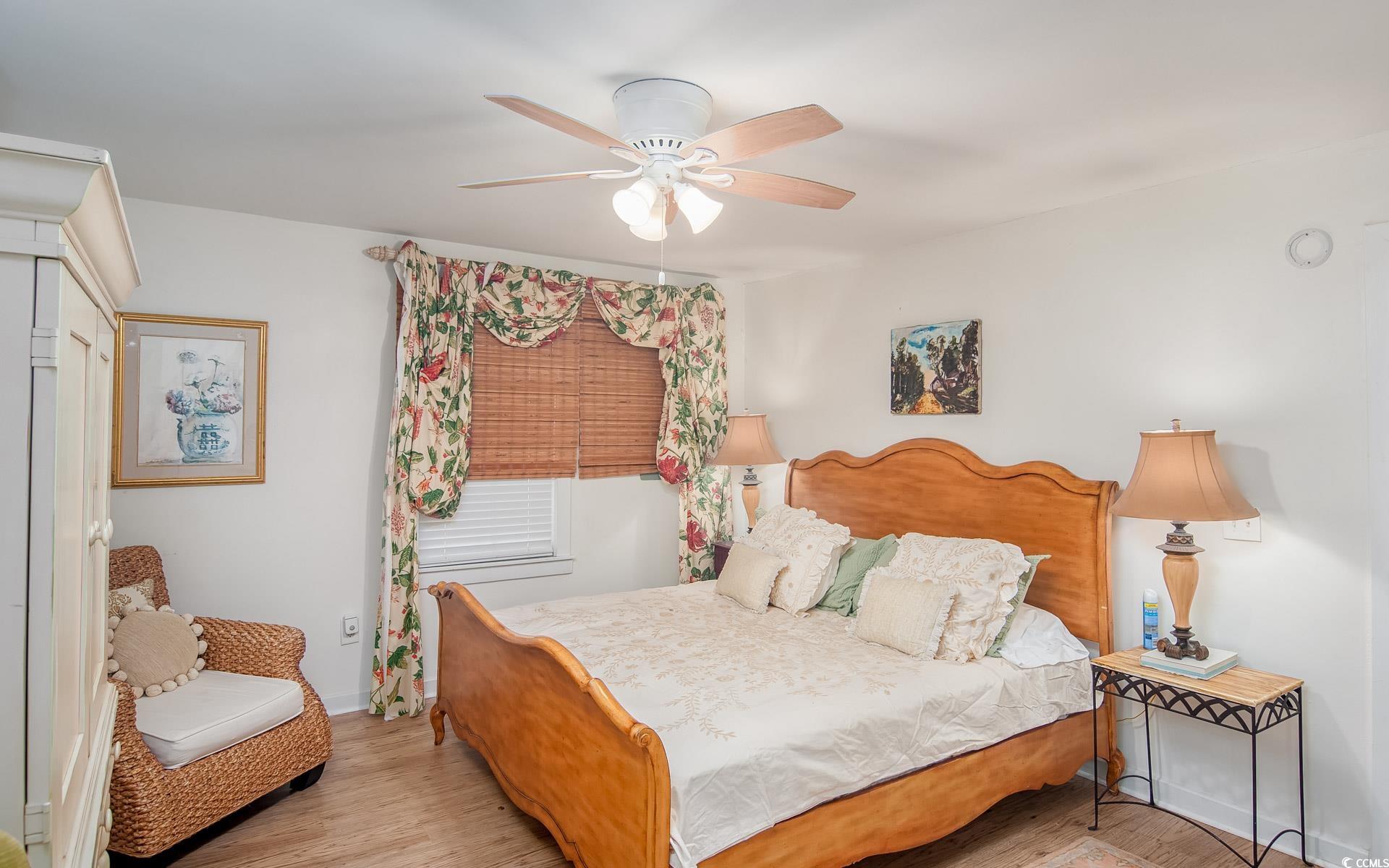 423 Highmarket Street Georgetown, SC 29440 - Photo 12 of 25 Bedroom featuring wood finished floors and ceiling fan