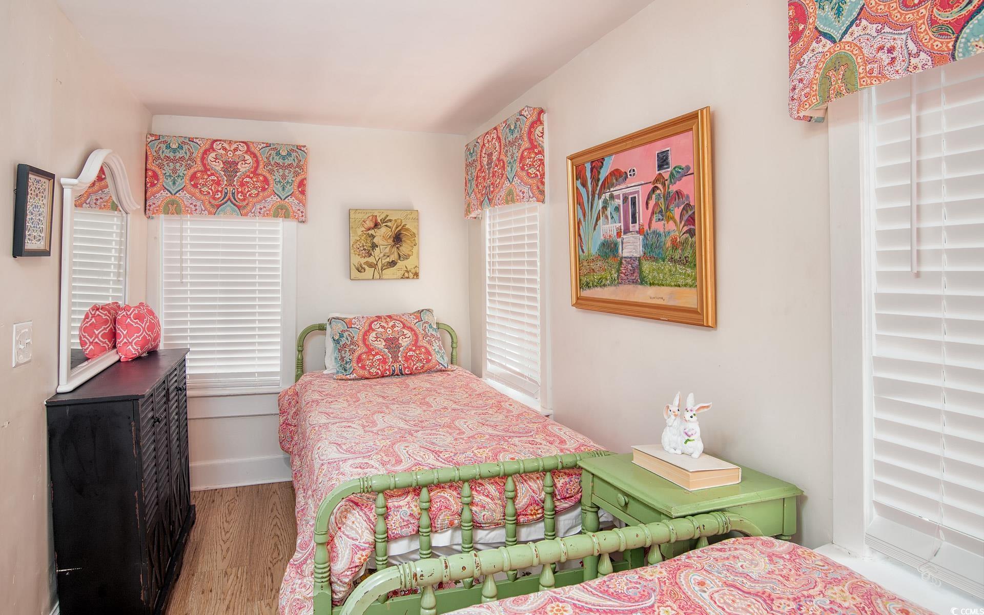 423 Highmarket Street Georgetown, SC 29440 - Photo 15 of 25 Bedroom featuring light wood-type flooring and baseboards