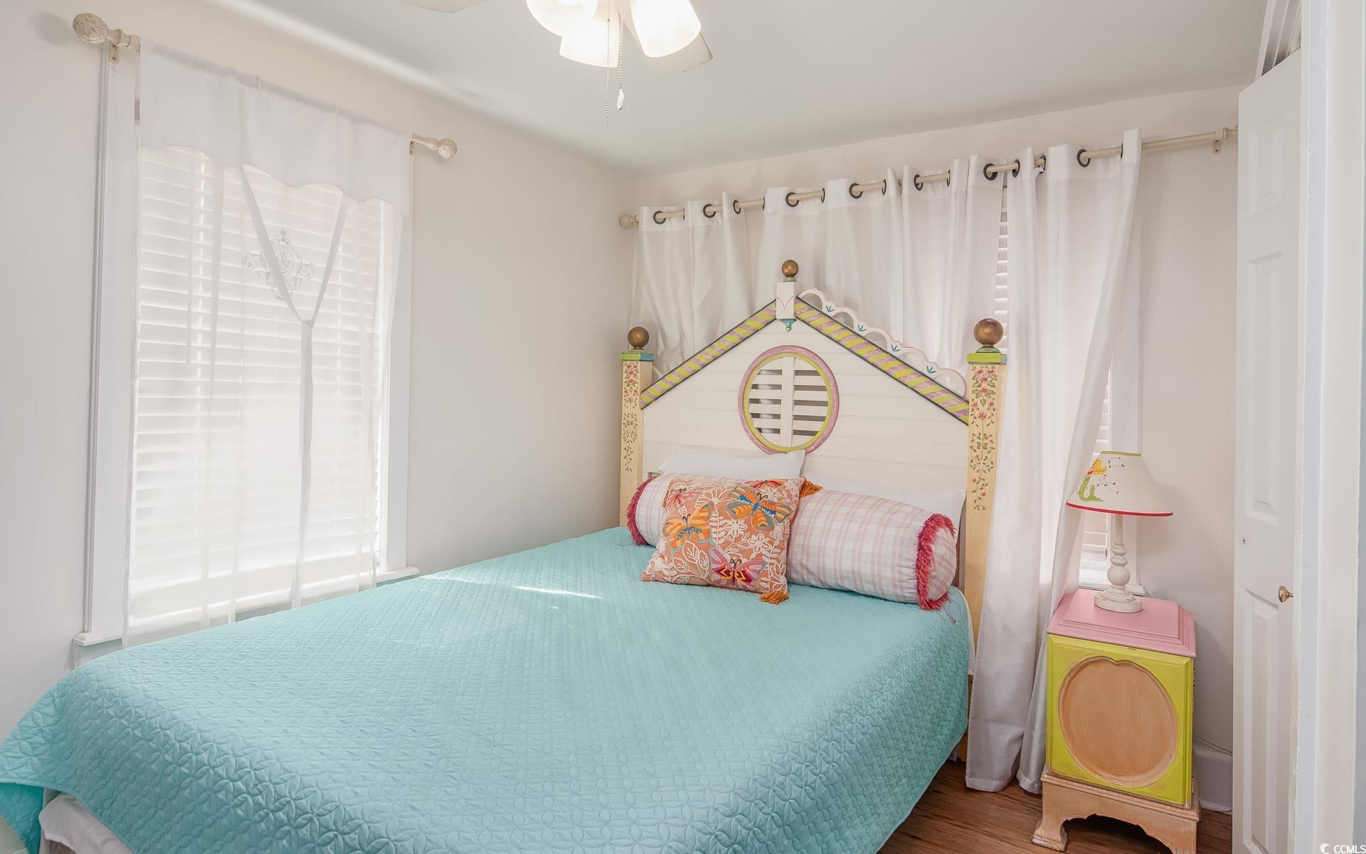 423 Highmarket Street Georgetown, SC 29440 - Photo 17 of 25 Bedroom with wood finished floors and ceiling fan