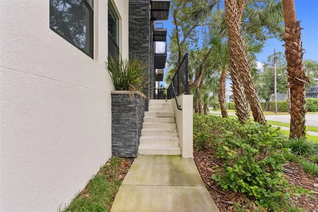 a view of a pathway with house on both side