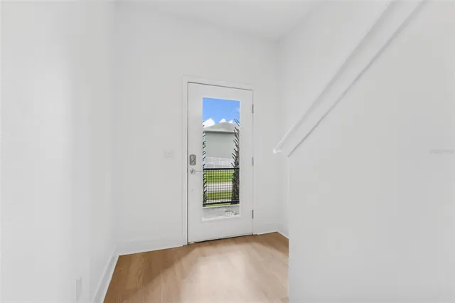 a view of an empty room with window